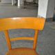 Vintage chair in brown faux leather and light wood, 1960s, padded seat.