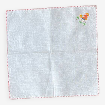 Small white cotton placemat embroidered by hand