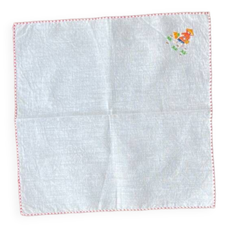 Small white cotton placemat embroidered by hand