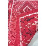 Red hand-woven carpet in pure wool