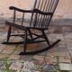 Rocking-chair vintage 50s in black lacquered wood