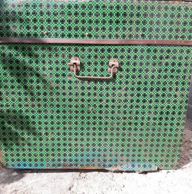 Vintage green metal trunk
