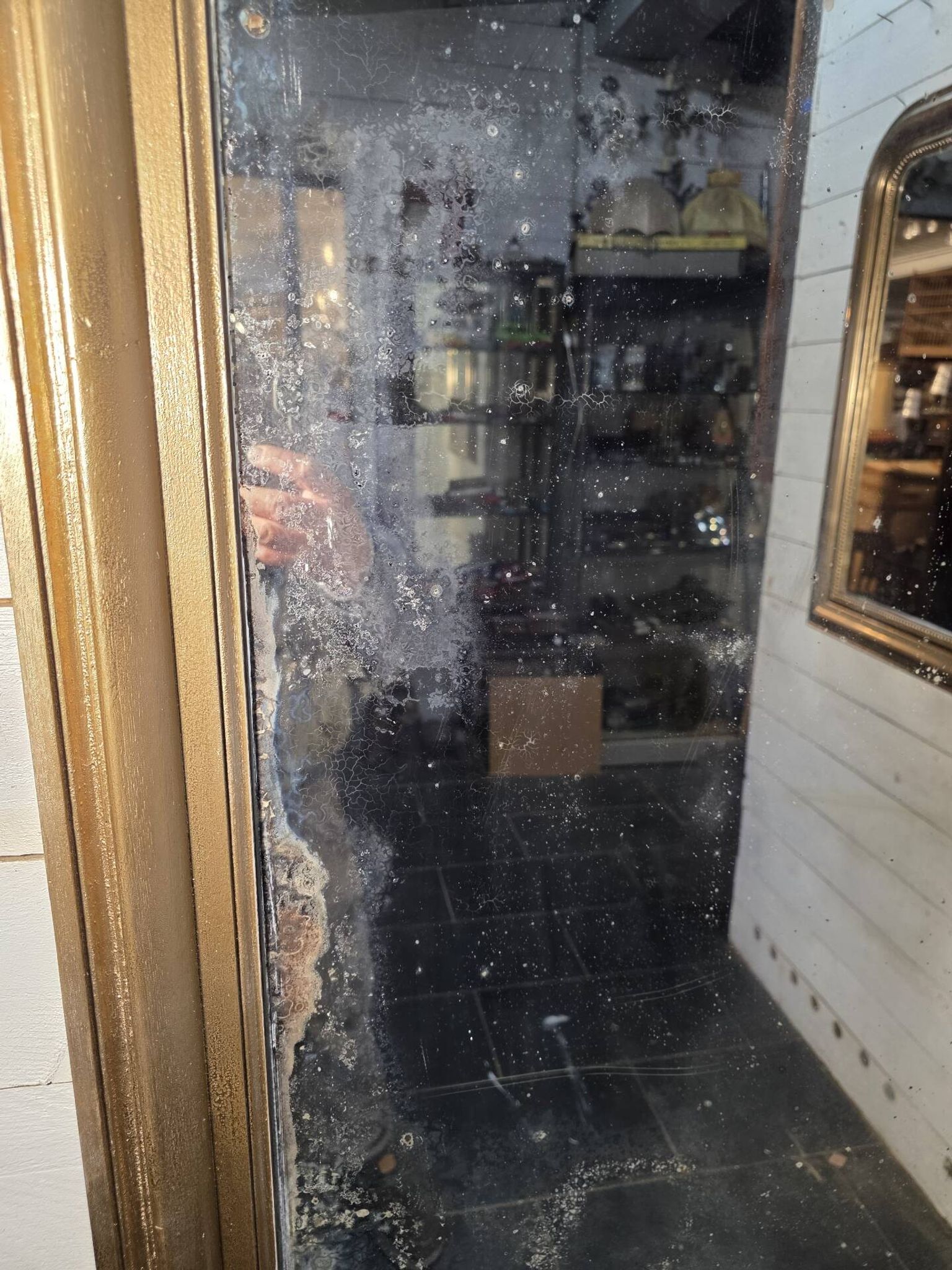 Golden mirror in oak from the 19th century.