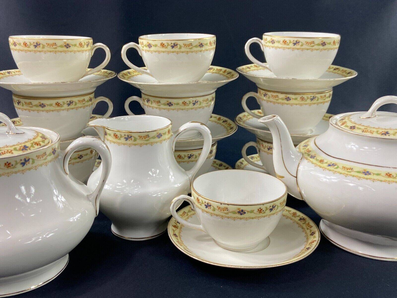 Limoges porcelain tea set Bernardaud Teapot sugar bowl milk pot cups