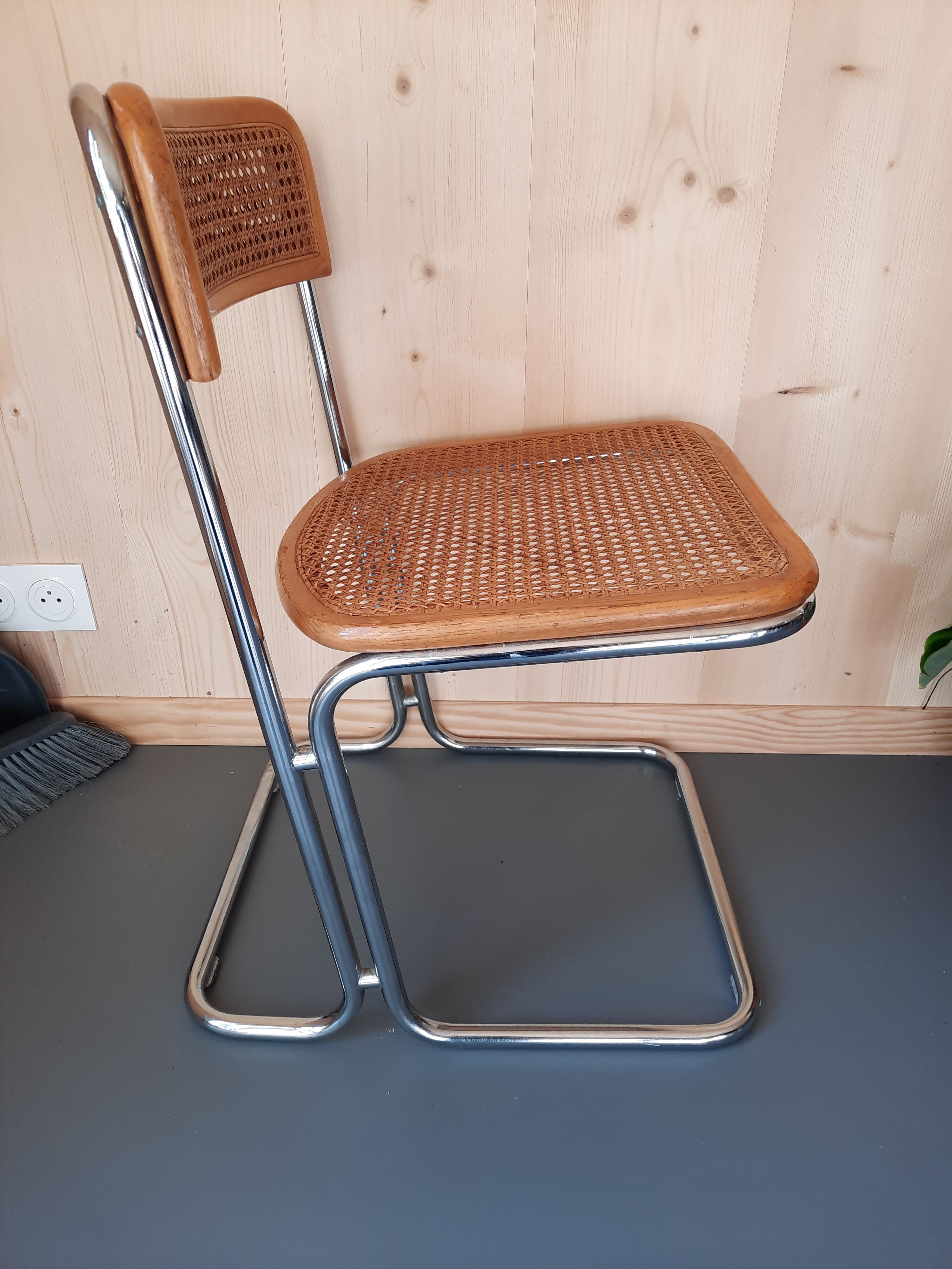 Set of 4 TIVIR chairs in cane and chrome metal.