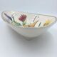 Triangular ceramic fruit basket