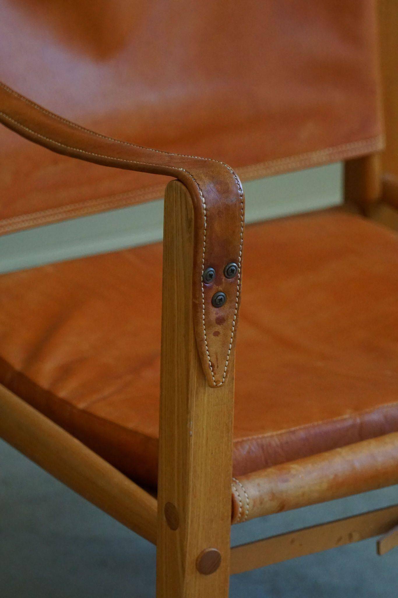 Kaare Klint, a pair of Safari chairs in ash and leather, Rud. Rasmussen, 1960s.