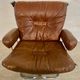 Vintage mid-century Scandinavian cognac leather lounge chair by Harald Relling