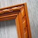 Old frame in worked wood