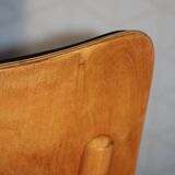 5 baumann chairs with large backs in black faux leather.