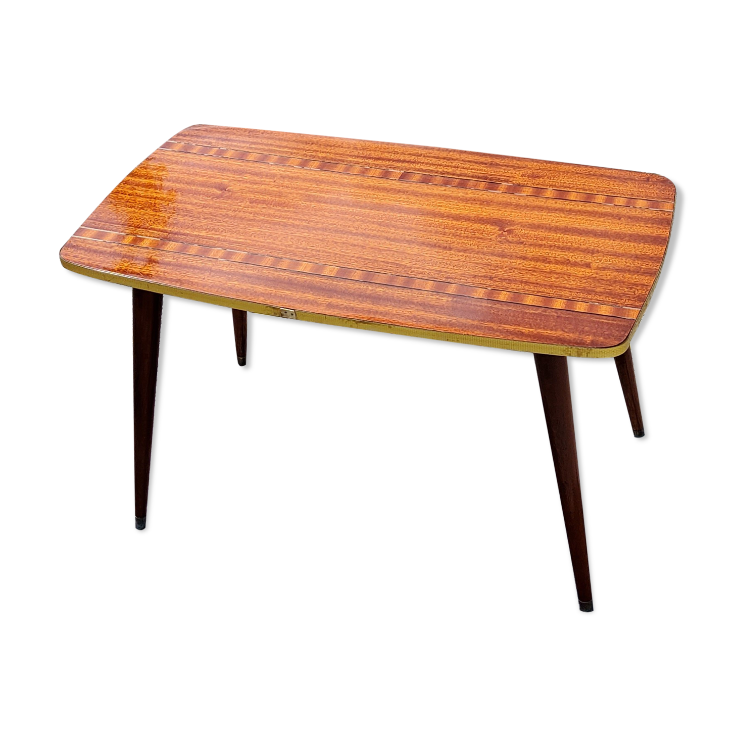 Table basse des années 60 en acajou doré pieds compas