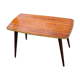 Table basse des années 60 en acajou doré pieds compas