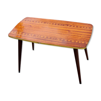Coffee table from the 60s in mahogany gold compass feet