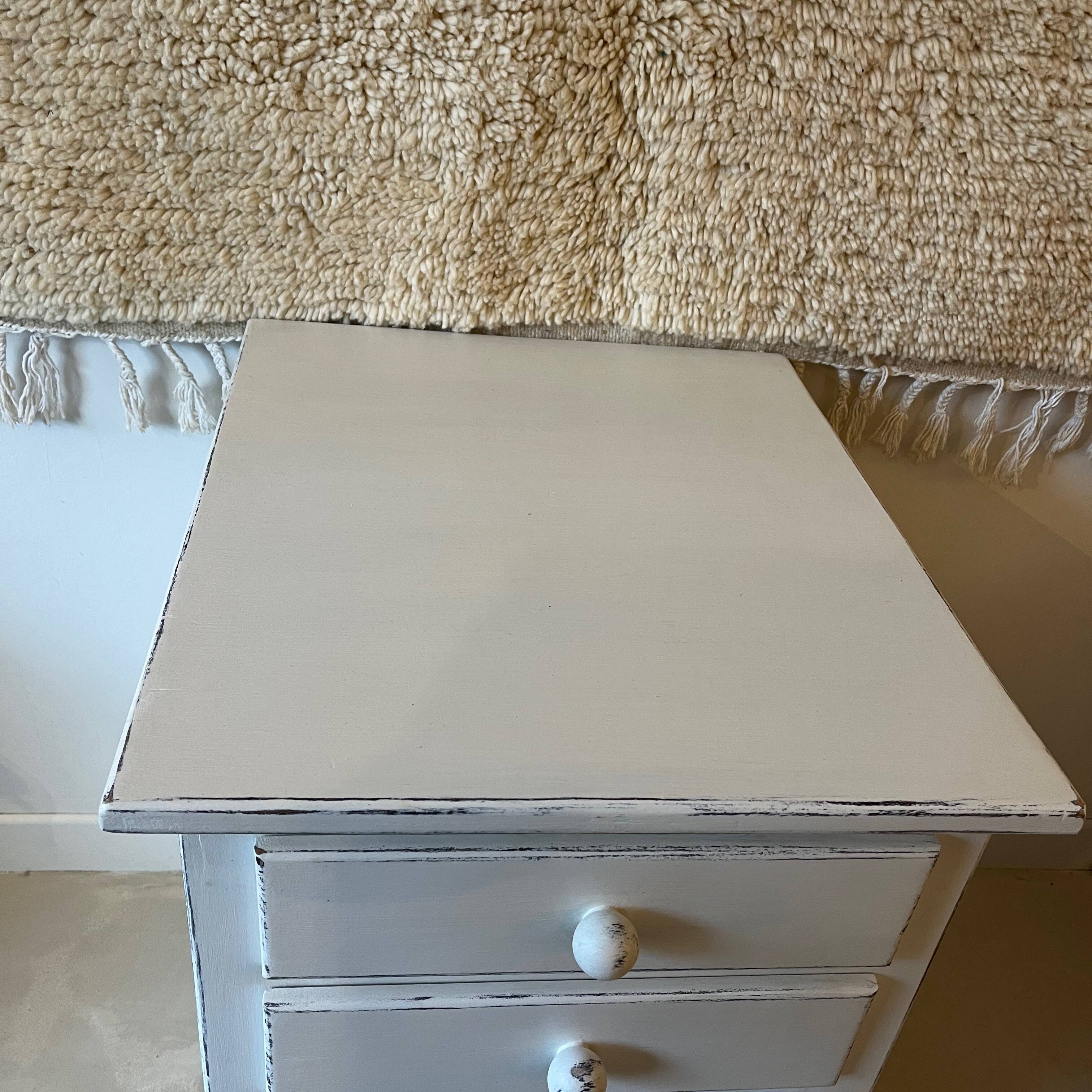 White patinated chest of drawers