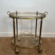 Table roulante ovale en laiton dans le goût de la Maison Jansen. Vers 1940