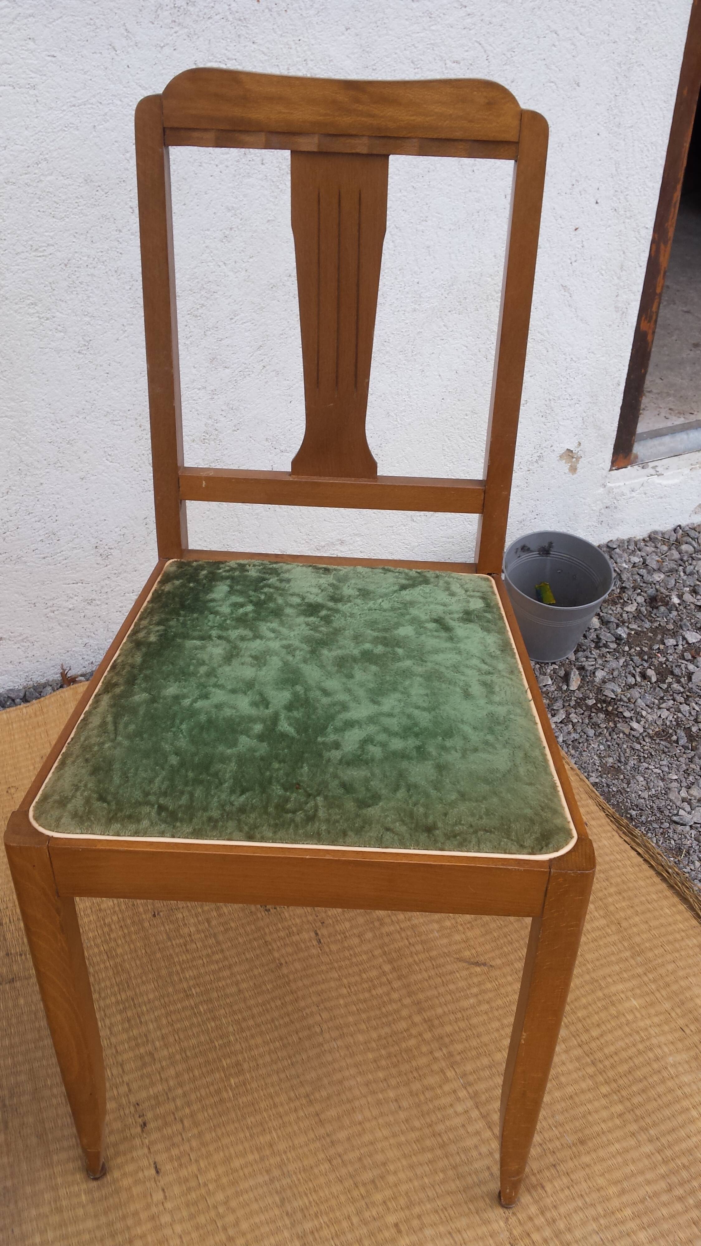 lot of 2 wooden chairs and green velvet