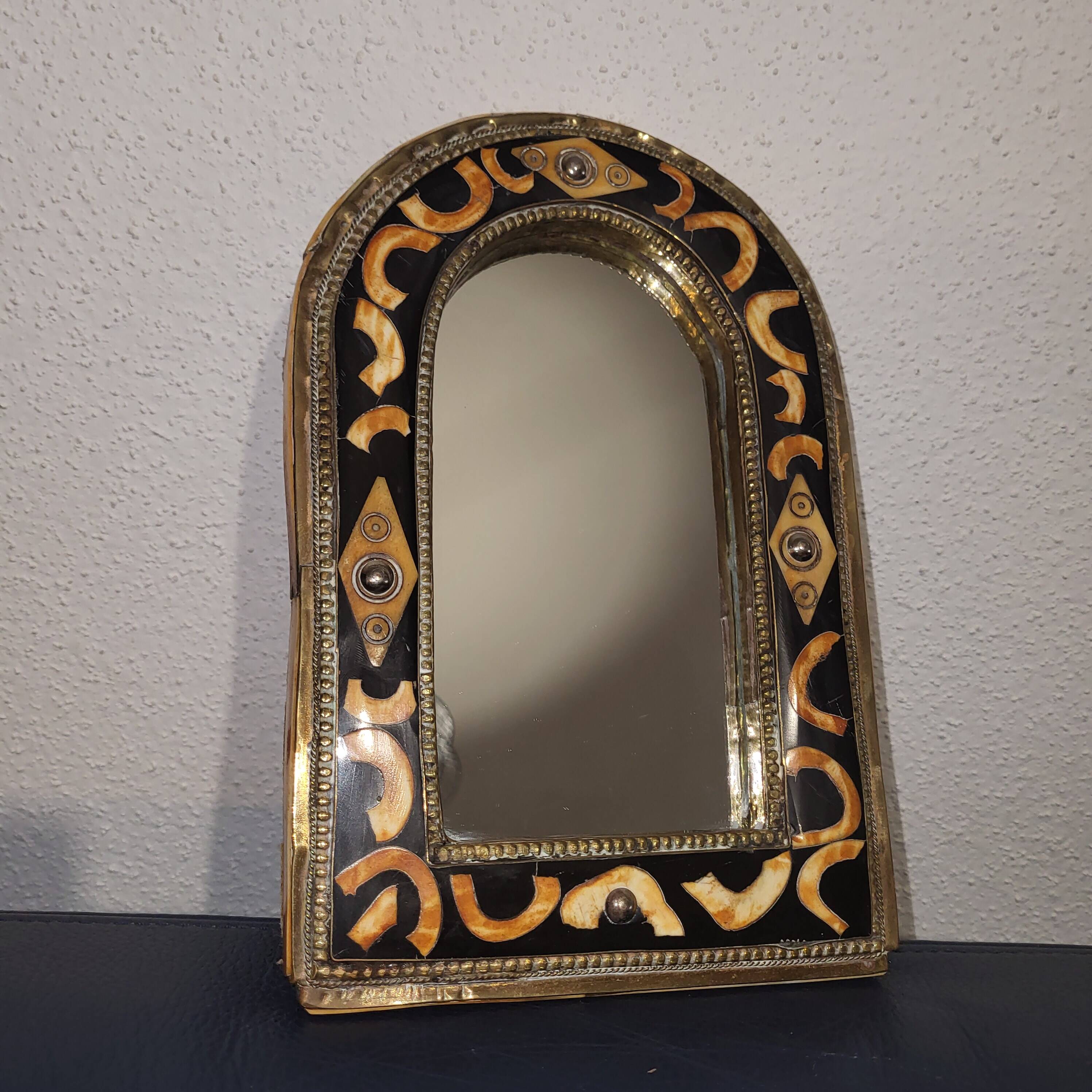 Oriental metal and bone mirror