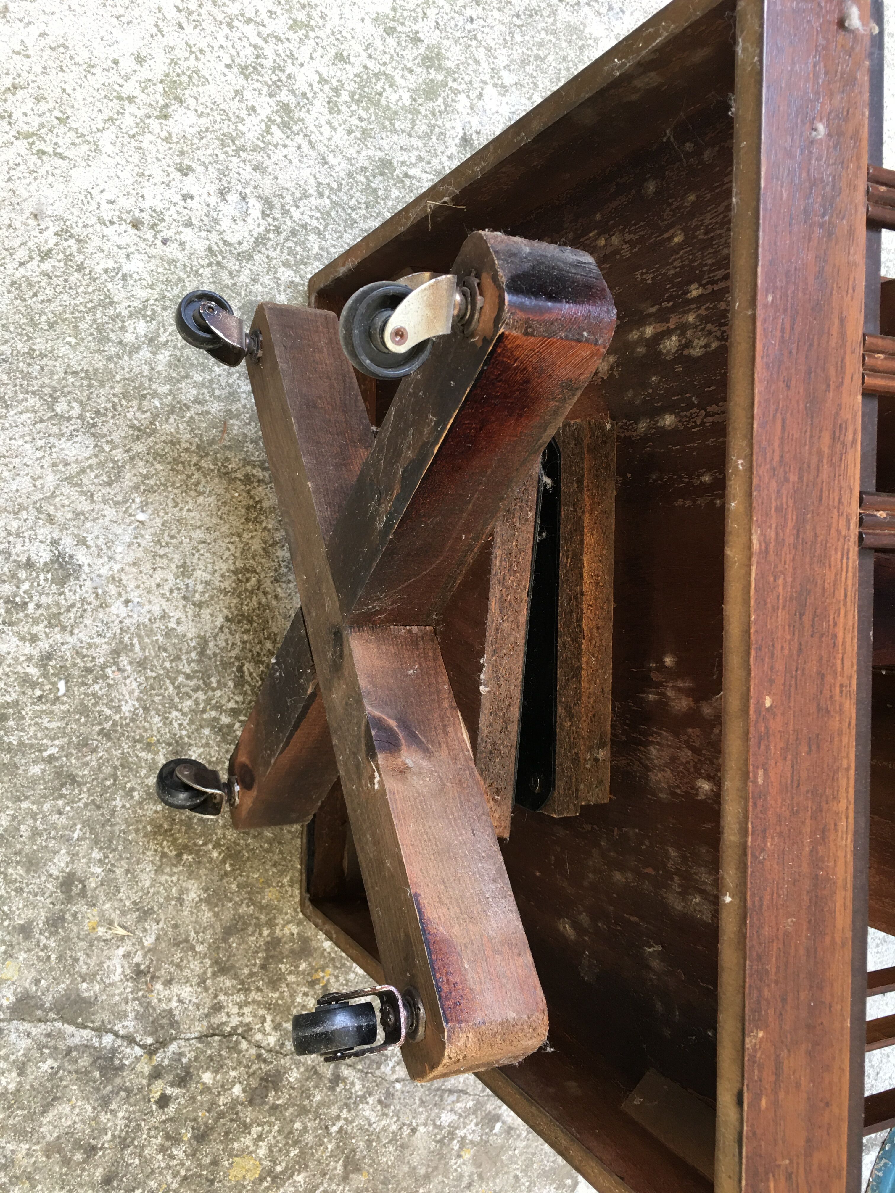 Revolving english library in mahogany, wheeled footing