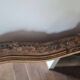 Antique Louis Philippe mirror with a pediment.