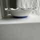 Small hand-painted earthenware salad bowl with garland of blue flowers, mark below