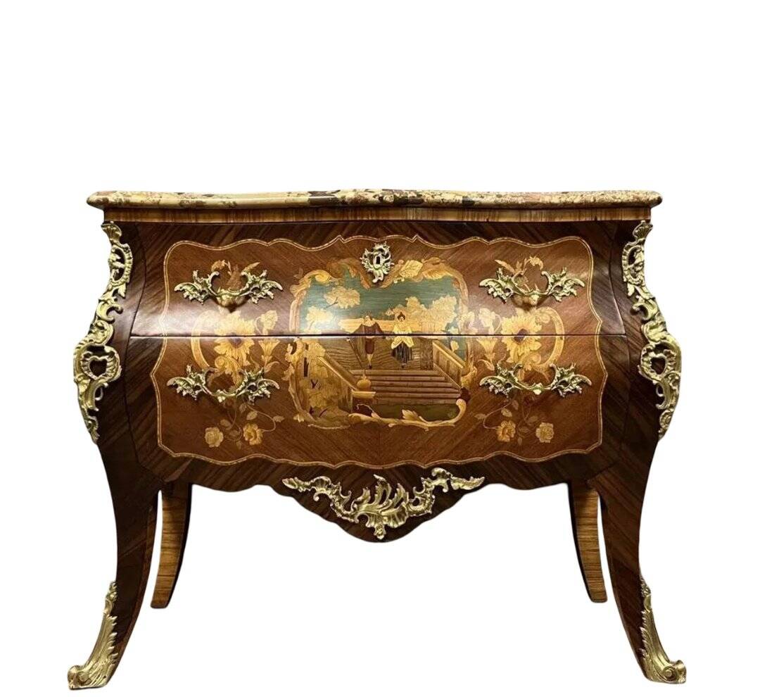 Commode sauteuse galbée style Louis XV estampillée en marqueterie