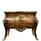 Commode sauteuse galbée style Louis XV estampillée en marqueterie