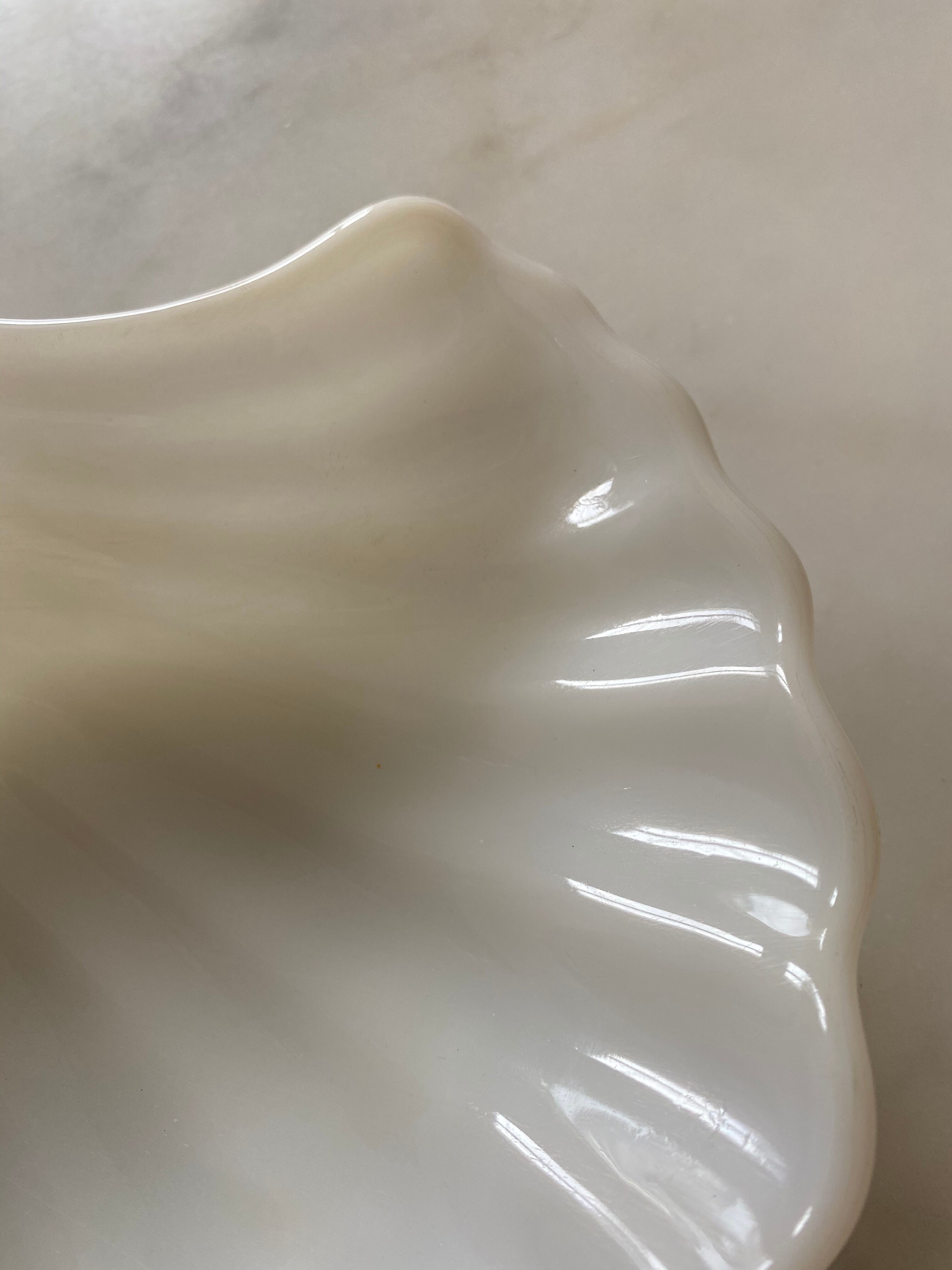 White opaline cup form shell