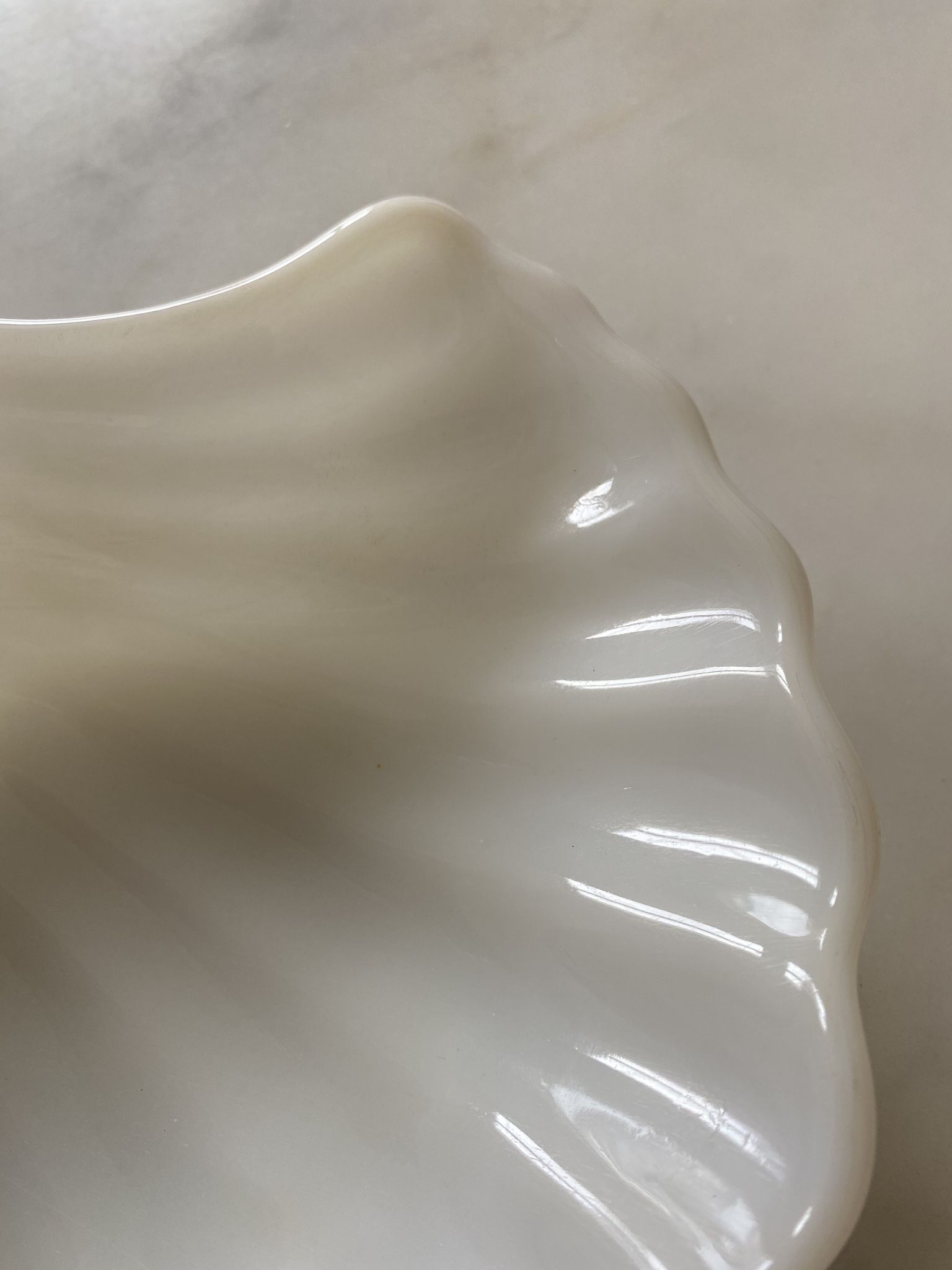 White opaline cup form shell