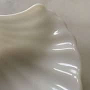 White opaline cup form shell