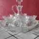 Service 1 carafe, 6 glasses and 1 tray in crystal.