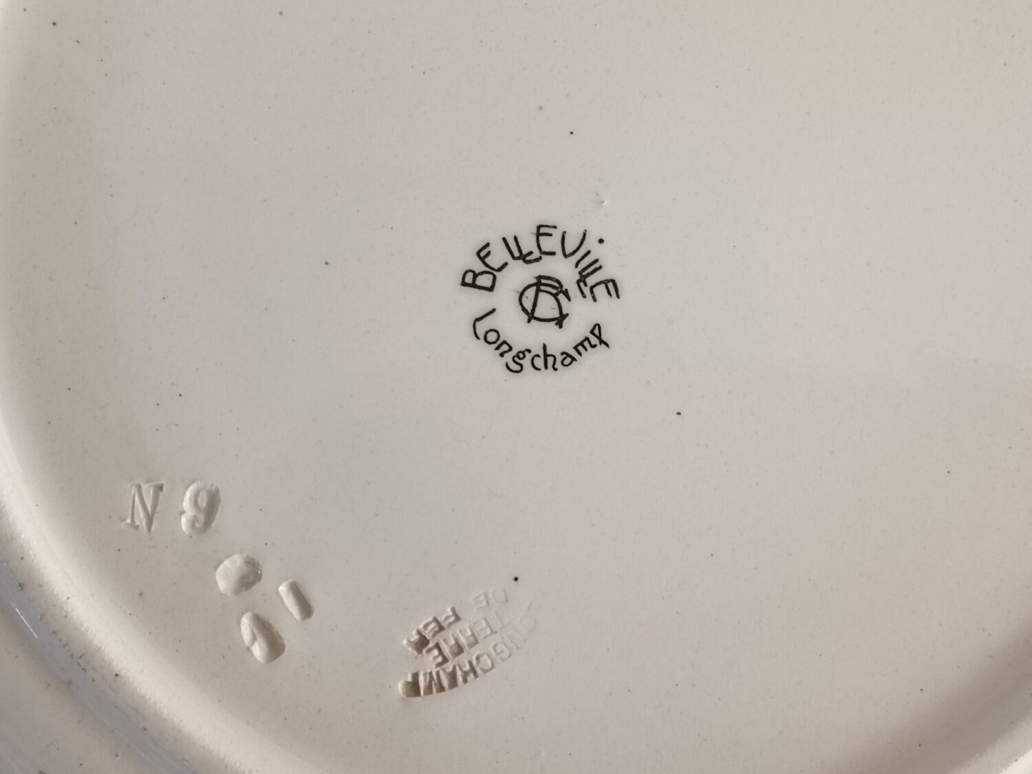 Round iron earth dish Longchamp Belleville