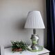 Mid Century Modern chromed table lamp with white pleated shade