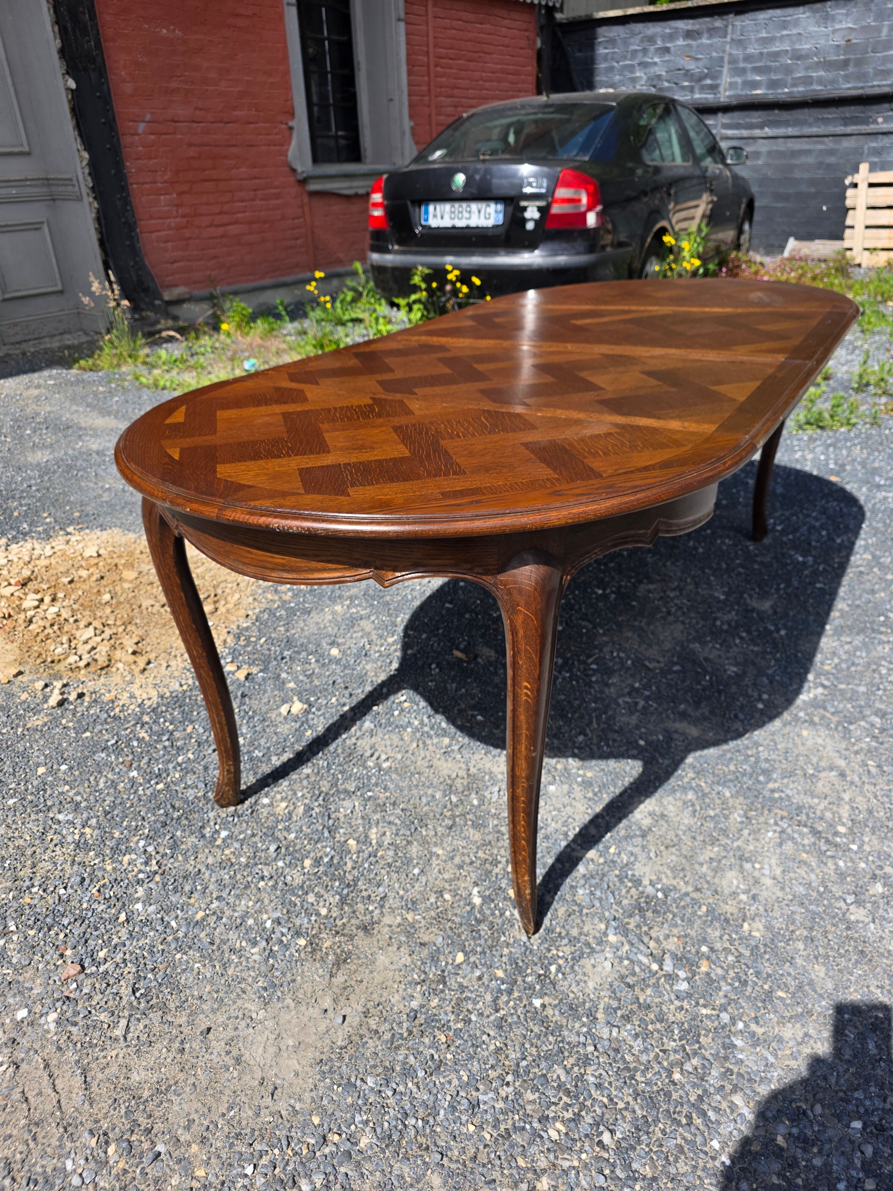Extendable table in Louis XV style in oak (2 extensions)