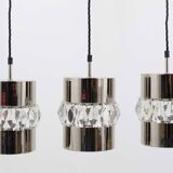 Three Bakalowits pendant lamps in nickel, brass, and faceted crystal, Austria, 1950s.
