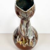 Large bird jug with high neck and handle, signed under the base