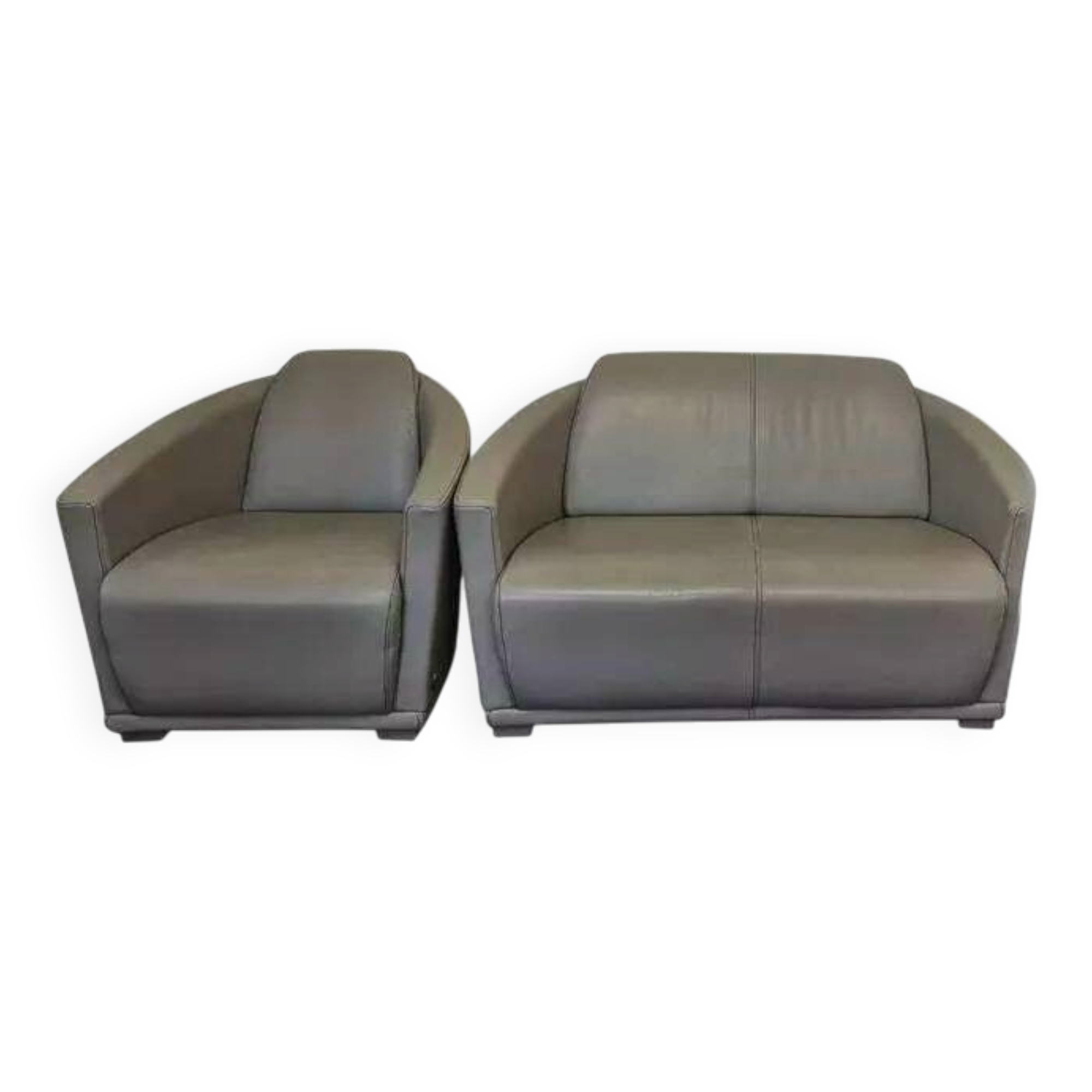 Two-seater sofa and a grey leather armchair Italia.