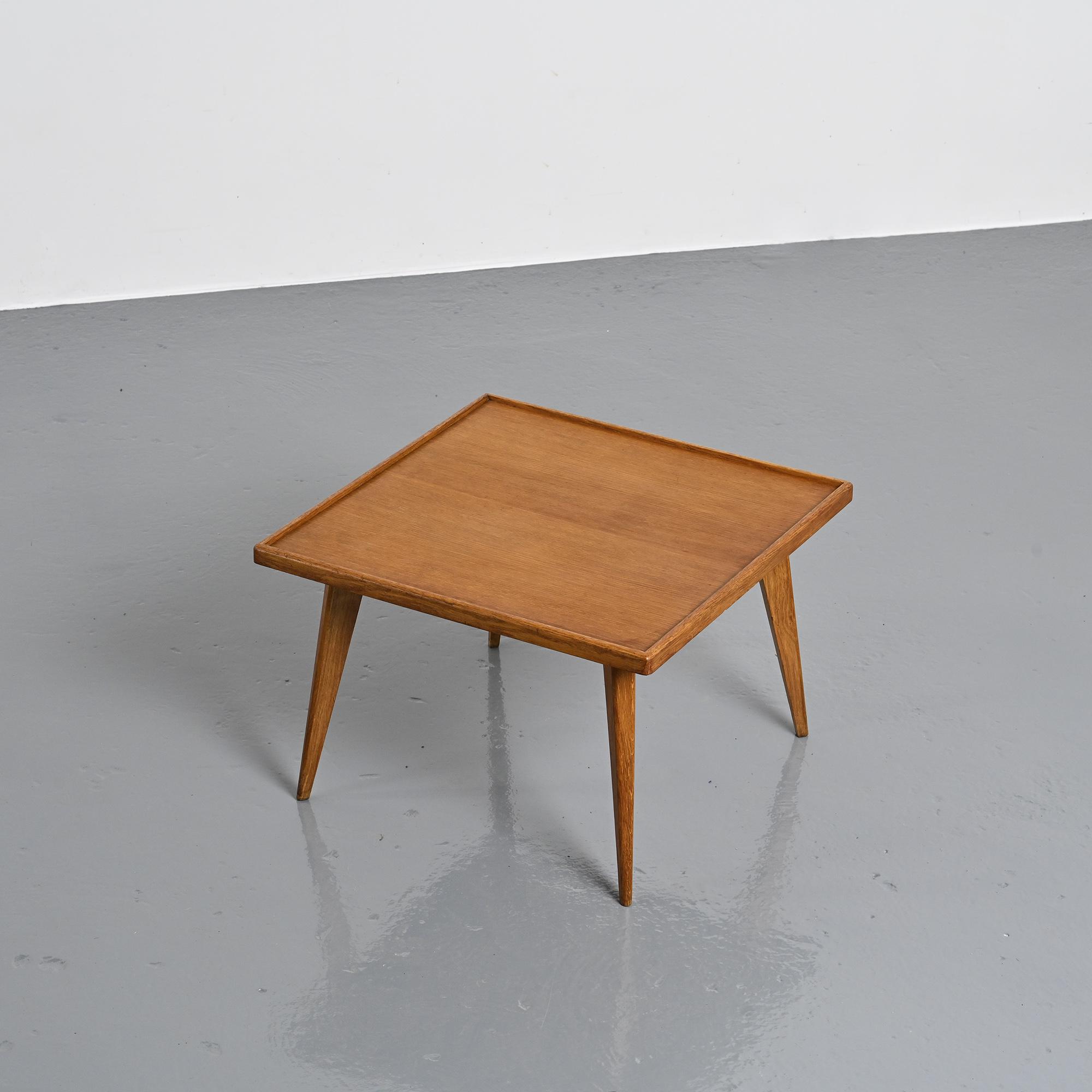 Coffee table with tapered legs, France, circa 1950-1960.