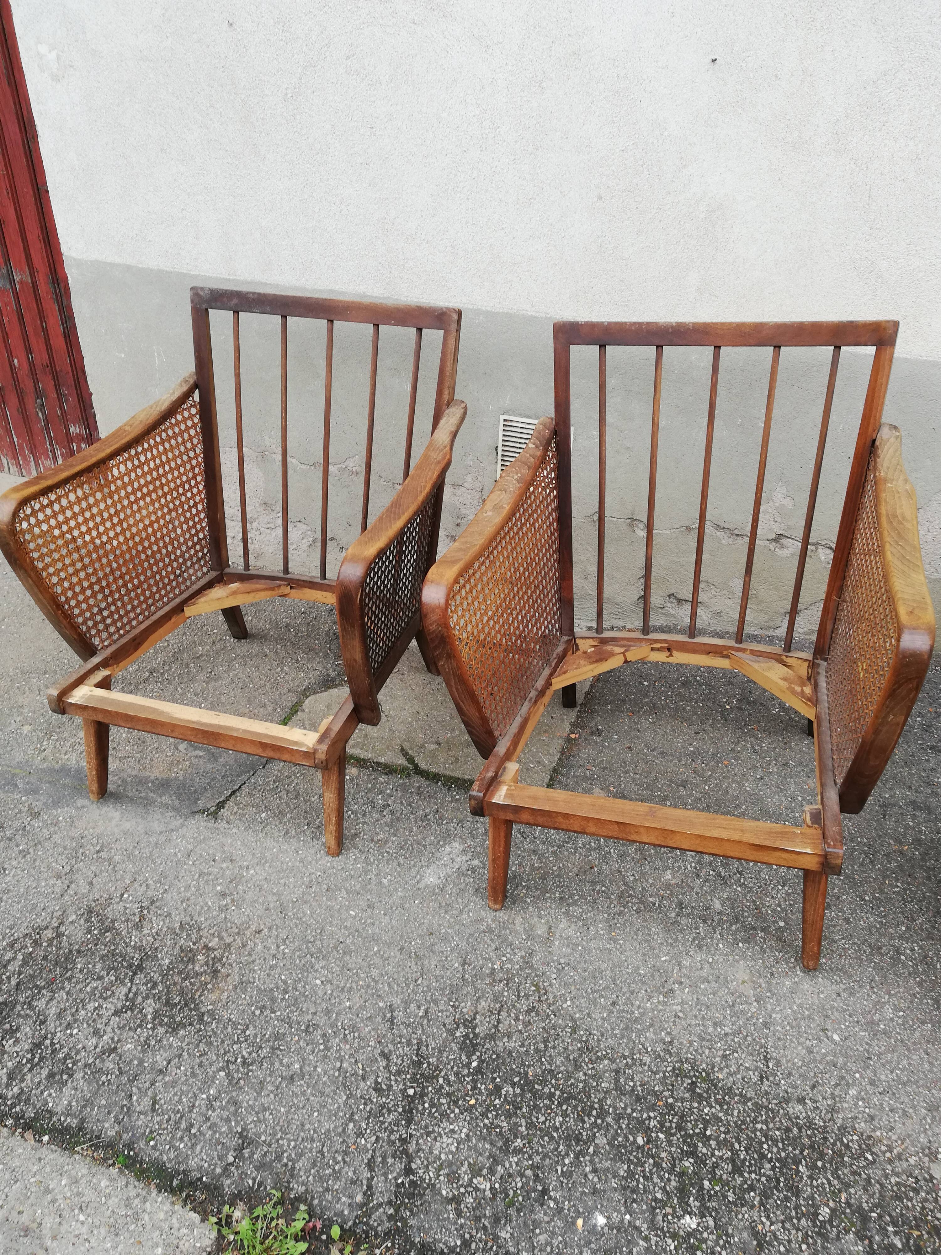 Paire de fauteuils vintage pieds compas et cannage
