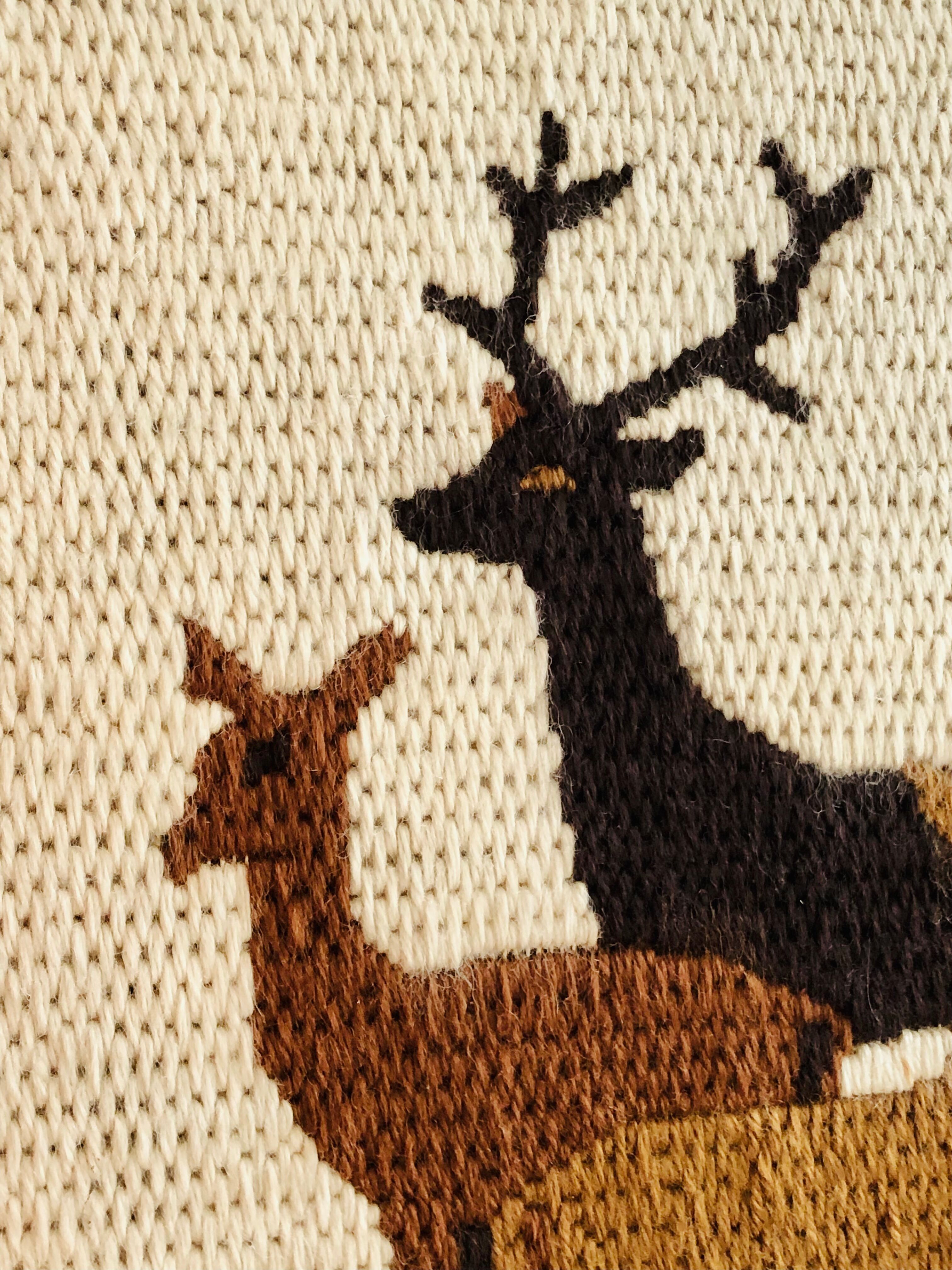 Vintage wool weaving deer family