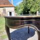 Napoleon III black lacquered wood and brass table