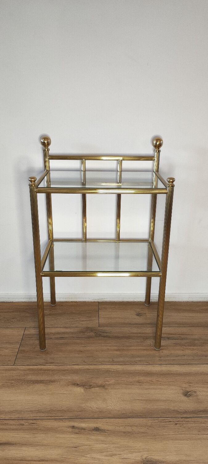 Bedside table in brass and glass.