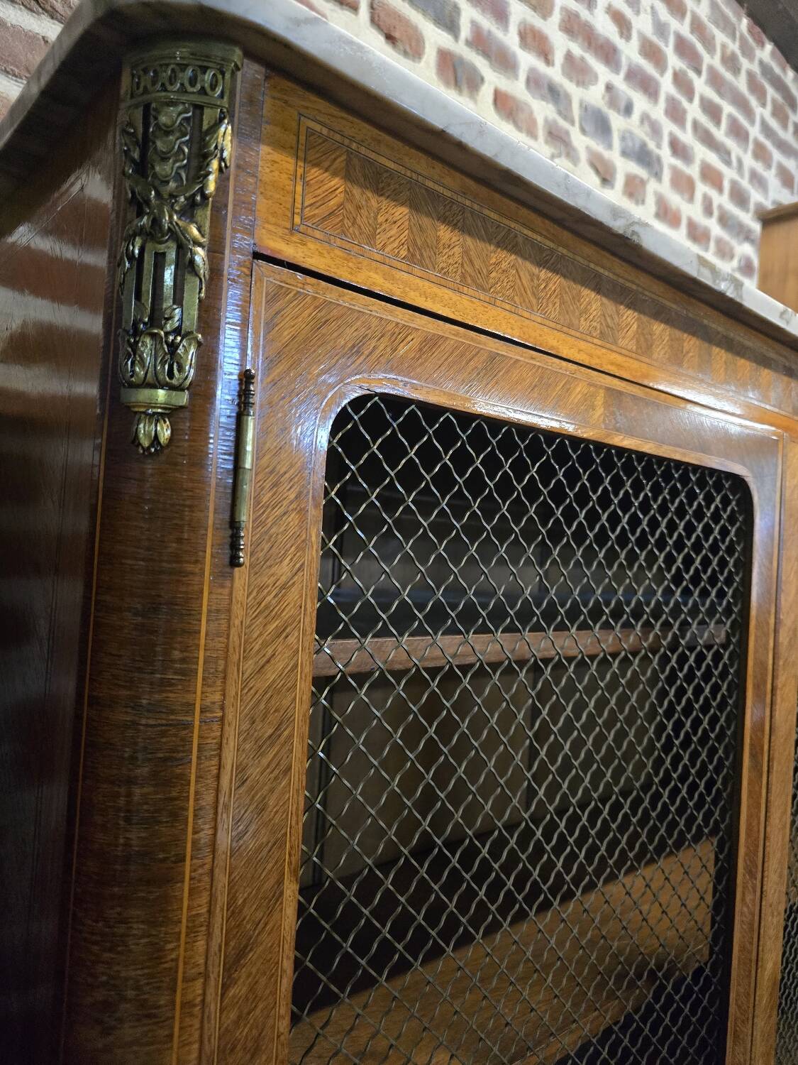 Marquetry bookcase with marble top