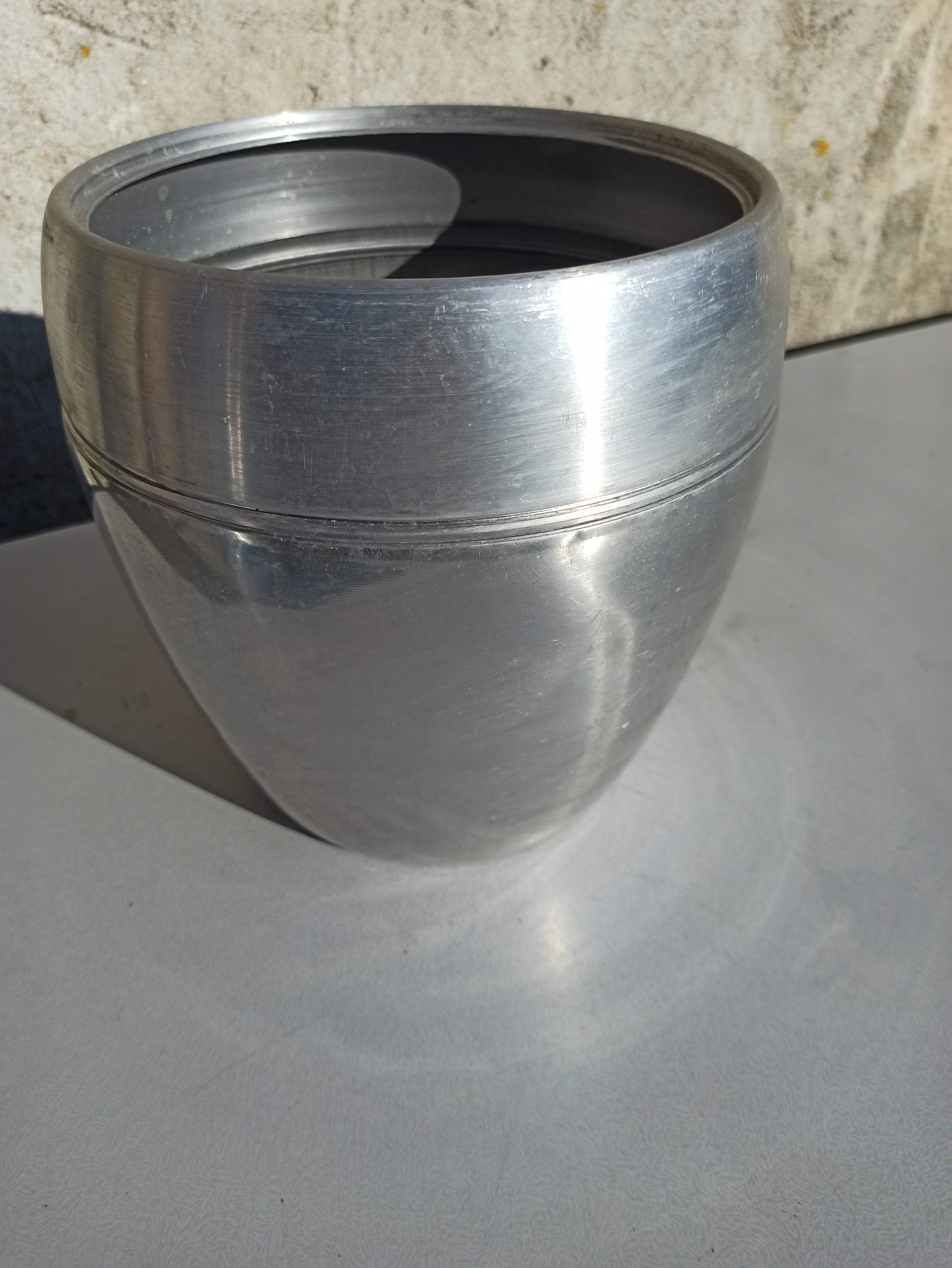 Old ice bucket ice cube in the shape of aluminum pear