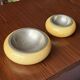 Set of two Aldo Tura bowls in goatskin and brass