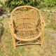 Fauteuil vintage corbeille rotin