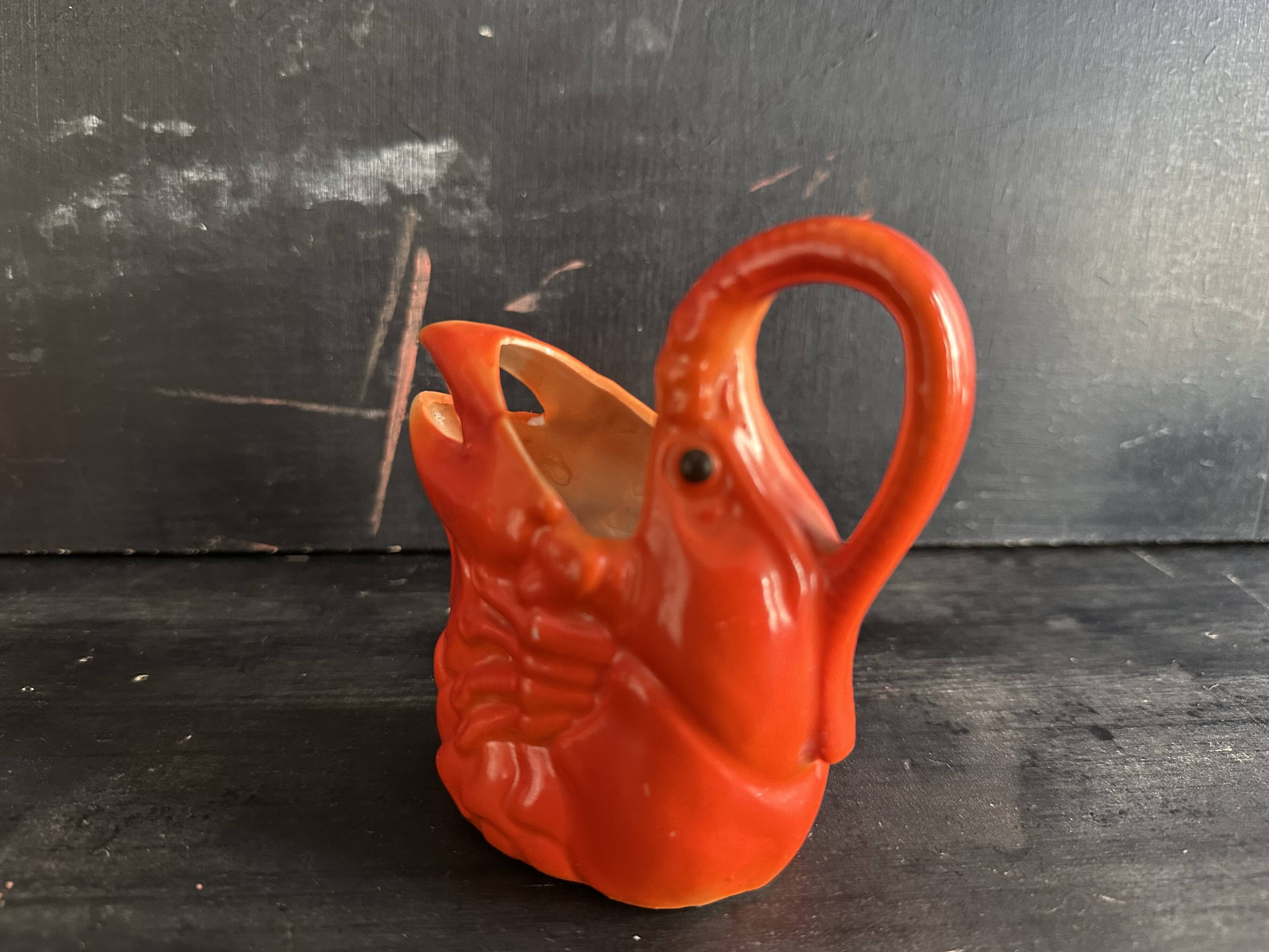 Antique ceramic lobster pitcher from the early 20th century.