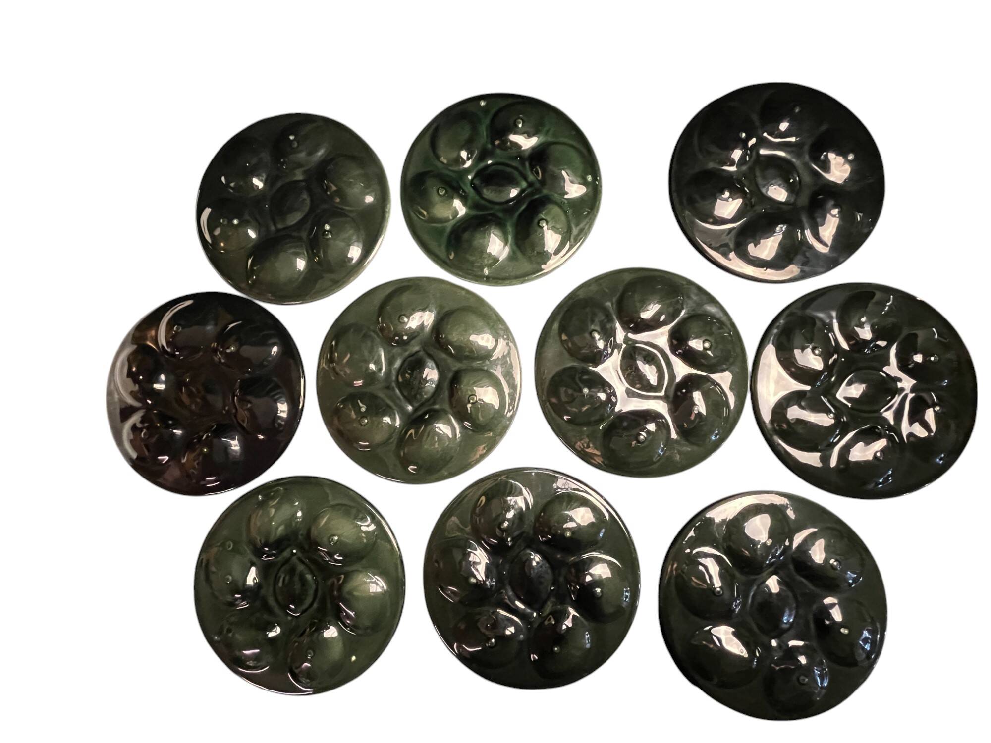 Set of 10 Saint Clément oyster barbotine plates circa 1940