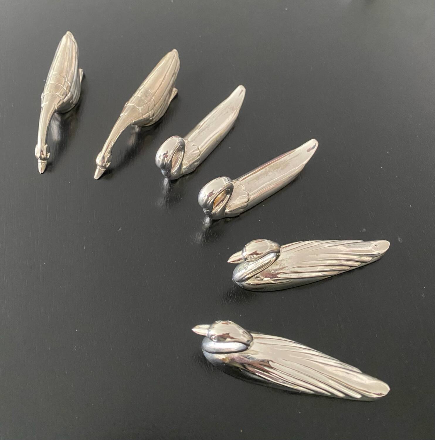 6 various animal knife holders in silver-colored metal