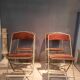 Set of four folding metal and velvet chairs