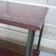 Wooden vintage table on wheels